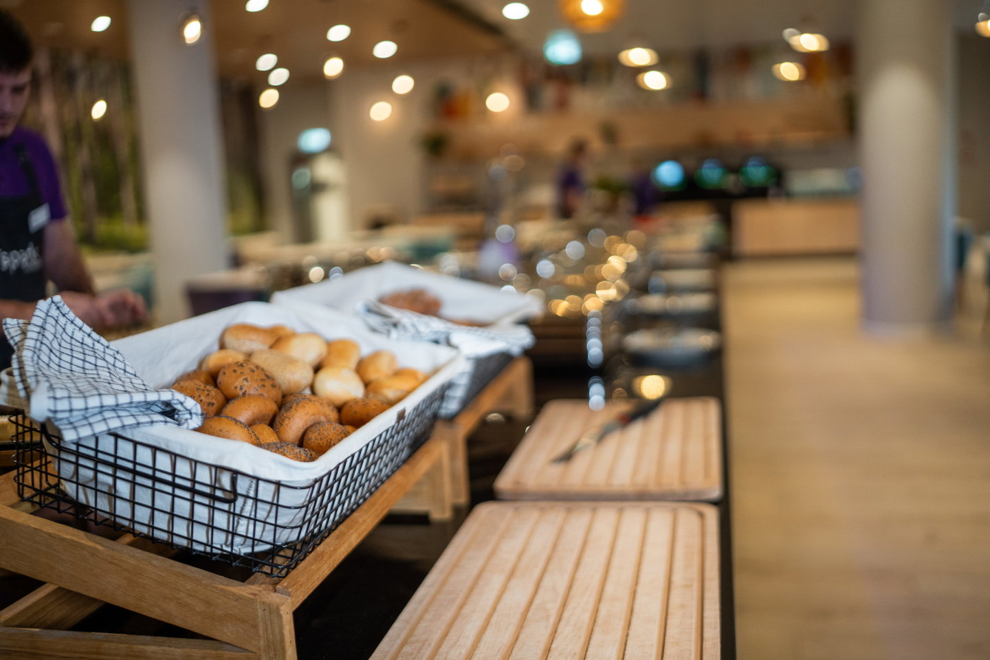 Fresh bagels on the free breakfast spread at a Spark by Hilton hotel