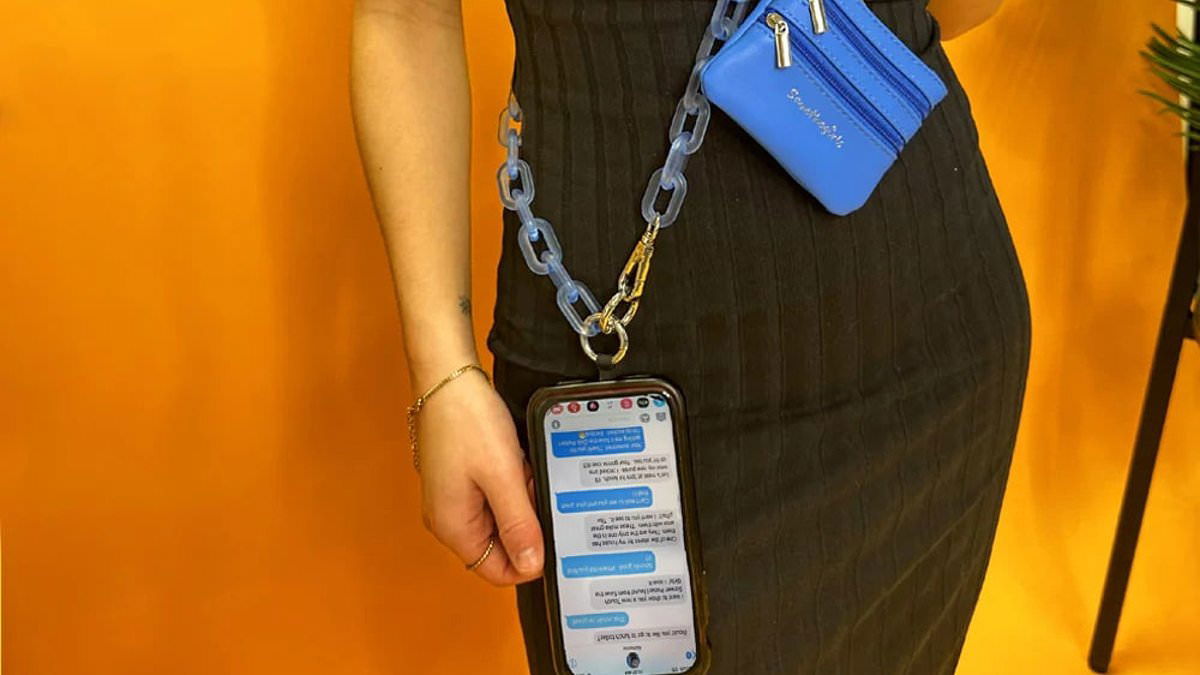 Go hands-free with the chic phone strap that keeps essentials close